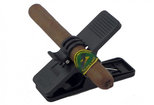 All-Purpose Cigar Clip for People on the Move., Keeps Cigar in Place Without Any Damage to Wrapper., Clamp Holds Cigar Minder in Place Anywhere